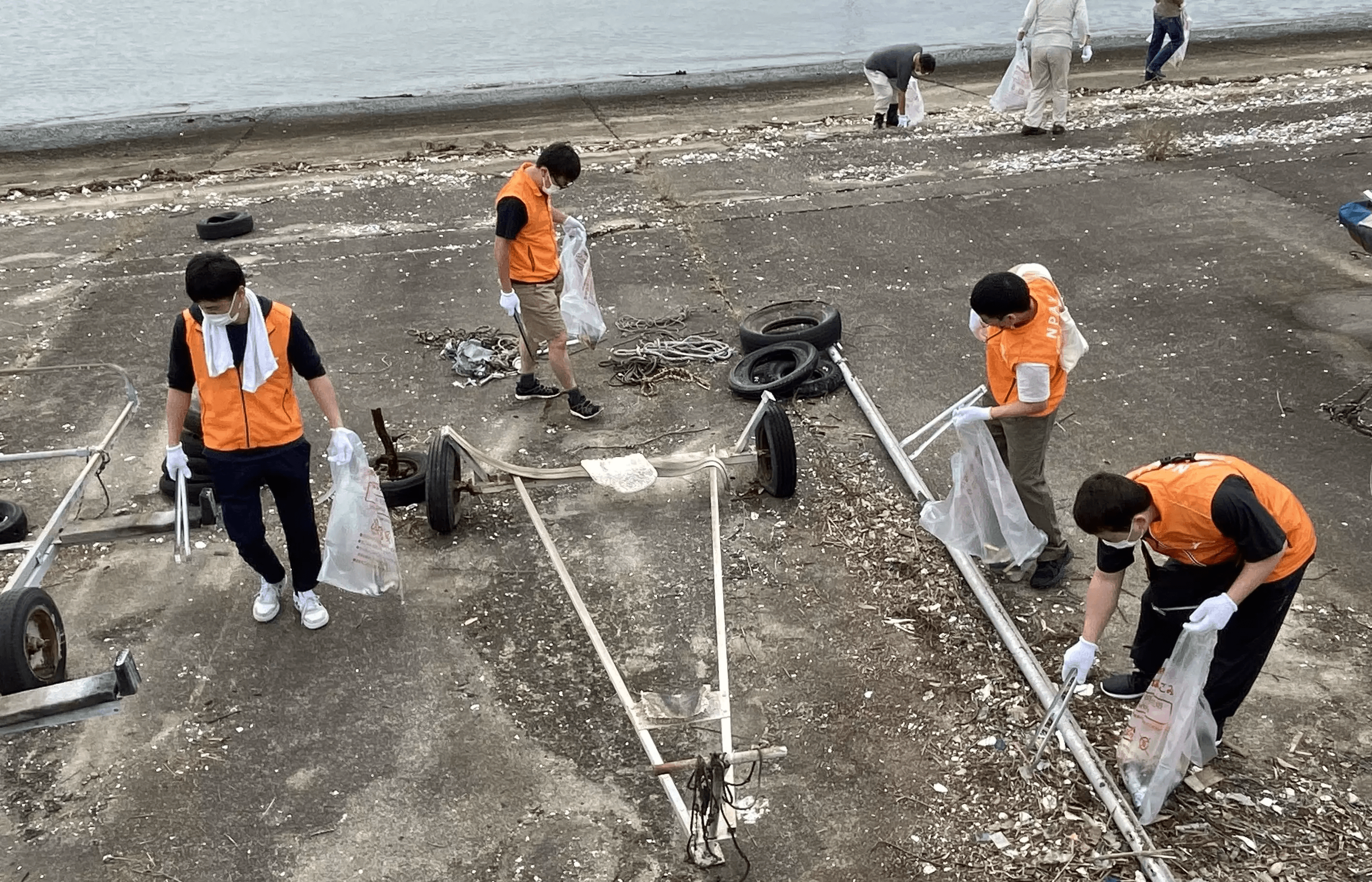 Employee volunteers participating in a neighborhood cleanup